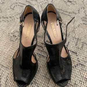 Prada platform python heels.